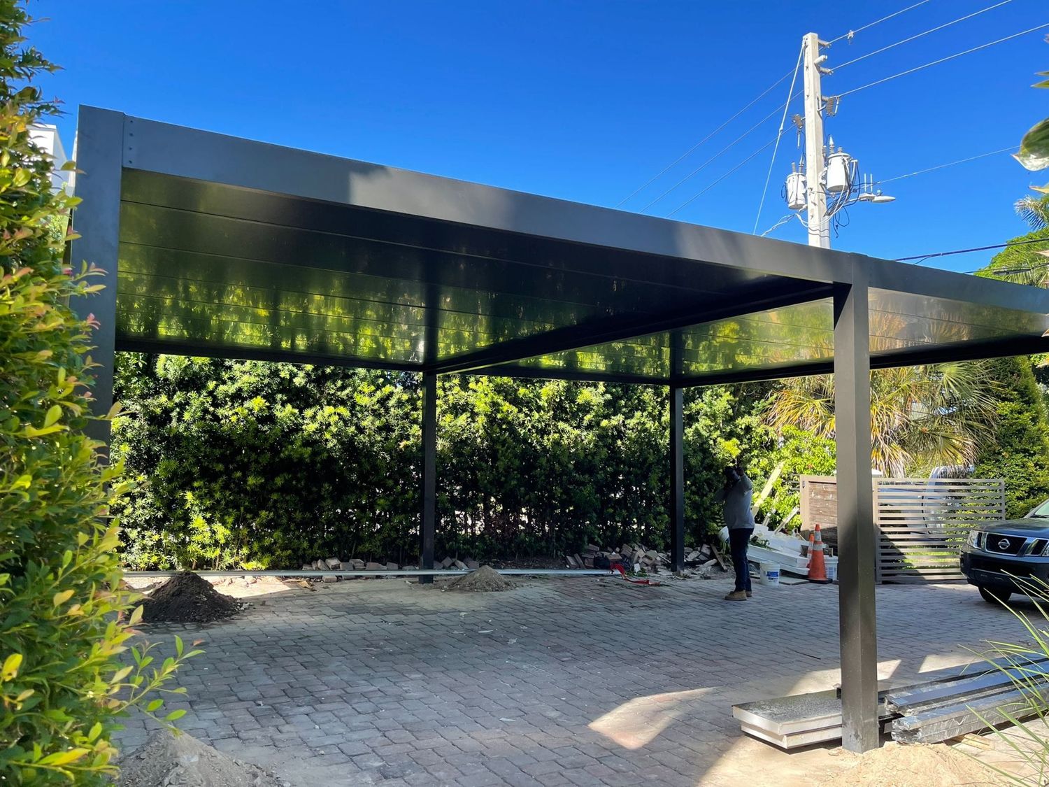 Insulated pergola over a driveway