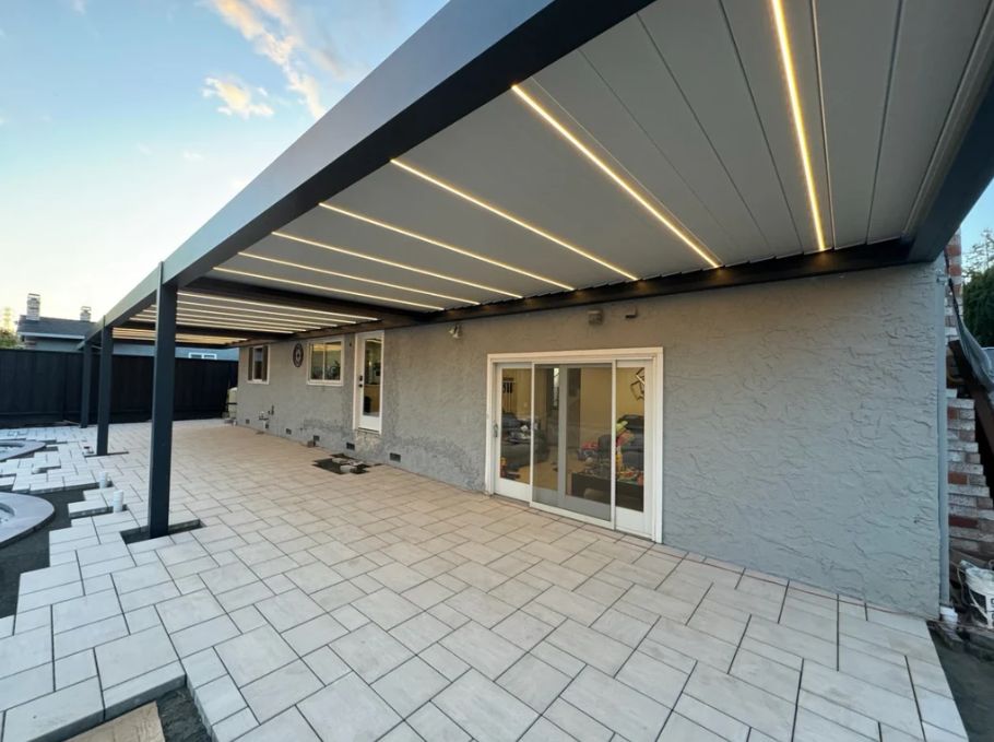 Wall mount pergola by a pool deck